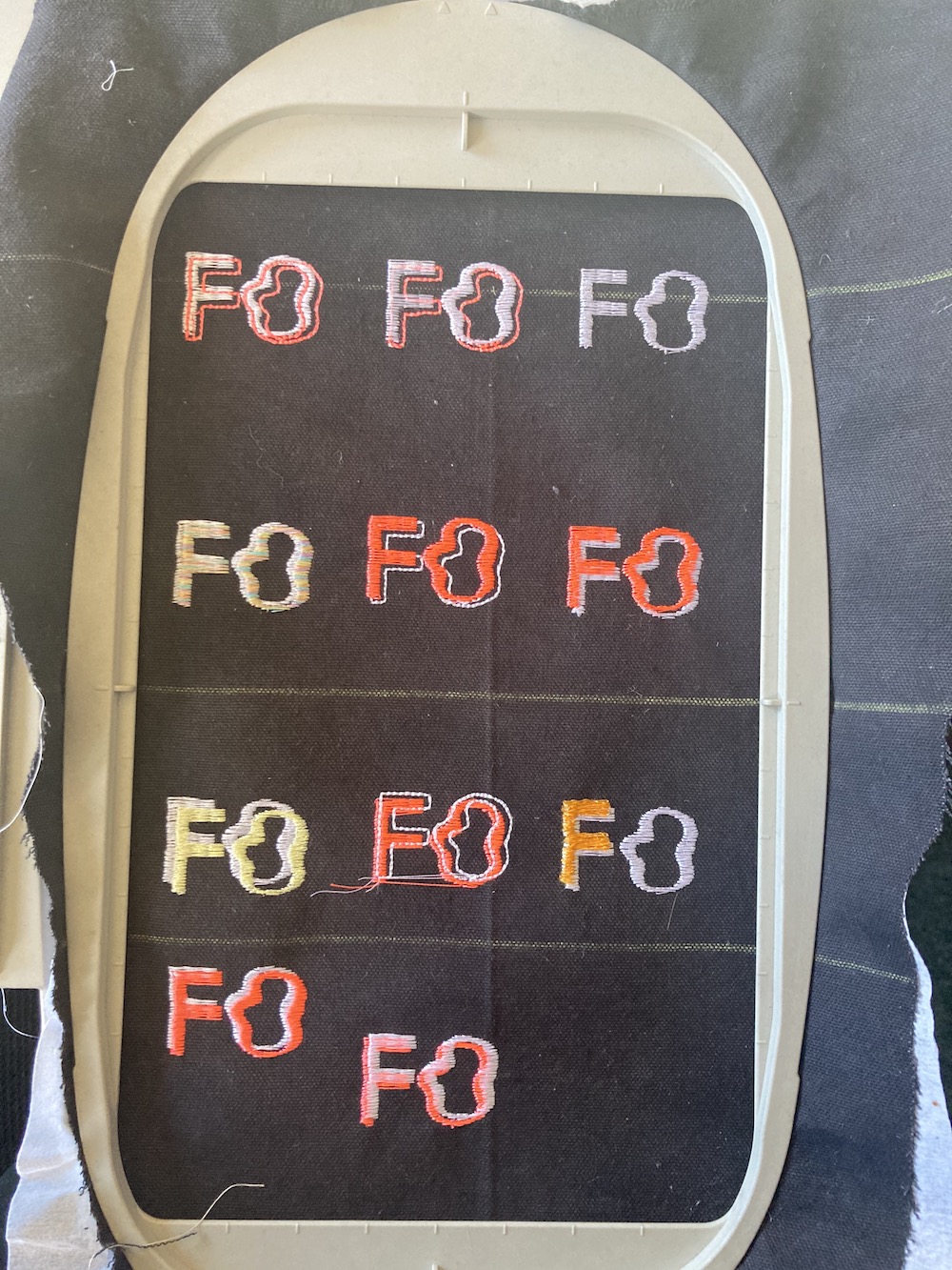 a number of different embroidered logos of the initials F.O.