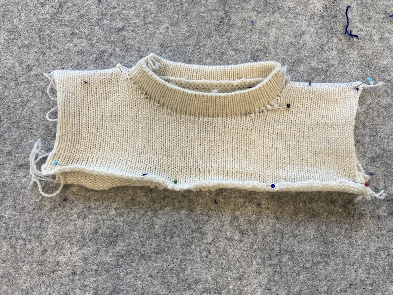 a knitted neck section